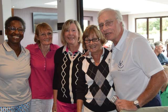 The second-place team, from left, Dorothy Norman, Caroline Skelton, Jackie Pearson and Andy Dean with club captain Trevor