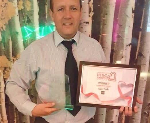 Rush Judo coach Pete Brent with the Community Award at the Heart Hertfordshire Hero Awards.