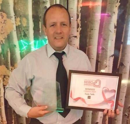 Rush Judo coach Pete Brent with the Community Award at the Heart Hertfordshire Hero Awards.