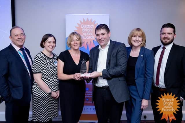 Last year's BrightSparc Awards and shows the joint team from MK College and Movey receiving their category accolade.