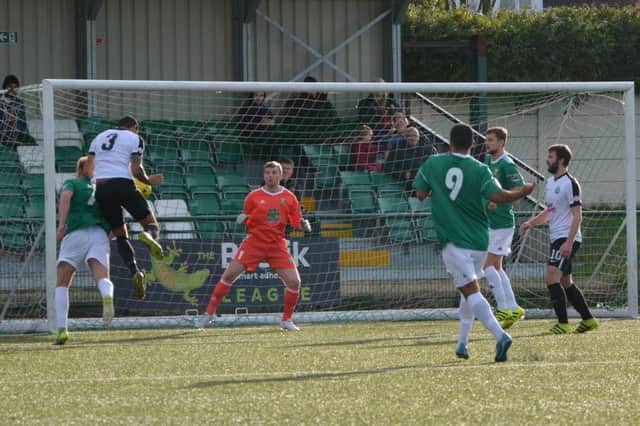 Callum Adebiyi scores Langleys goal in the 3-1 FA Trophy loss at Hendon